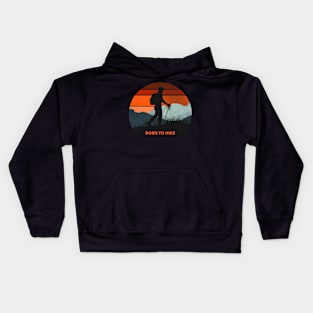 Silhouette of a man hiking in the mountains during sunrise Kids Hoodie